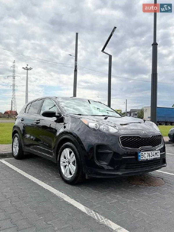 Kia Sportage — фото 1