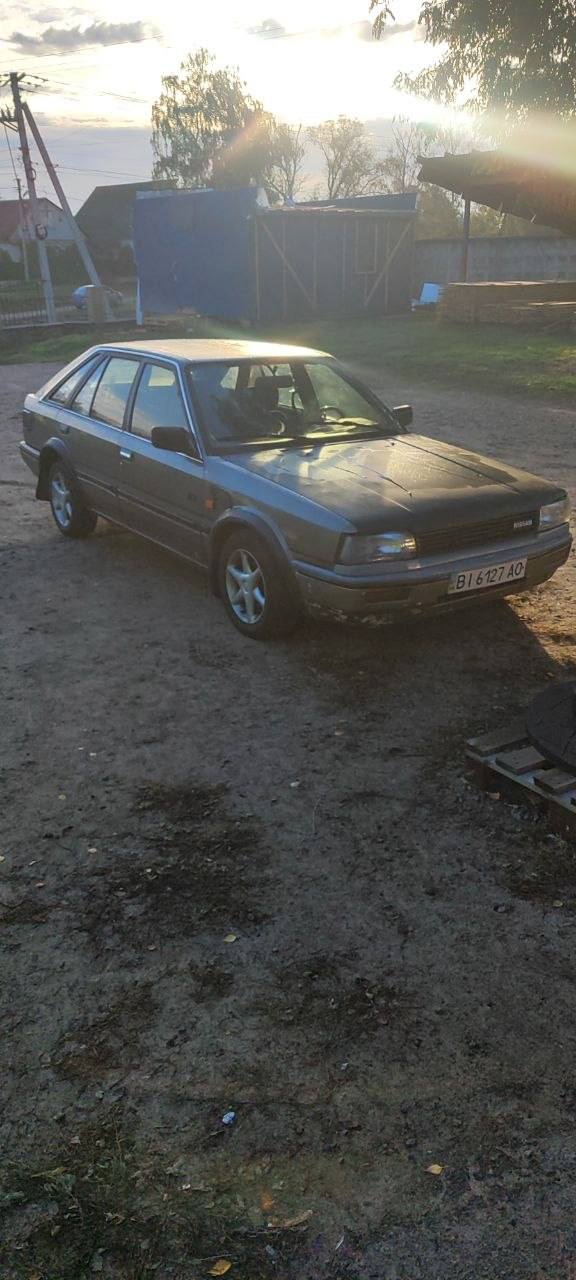 Nissan bluebird t12 hatchback — фото 1