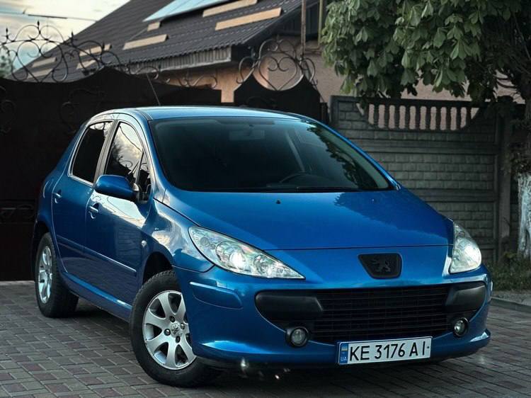 Peugeot 307 — фото 1