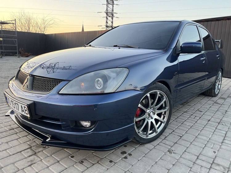 Mitsubishi Lancer — фото 1