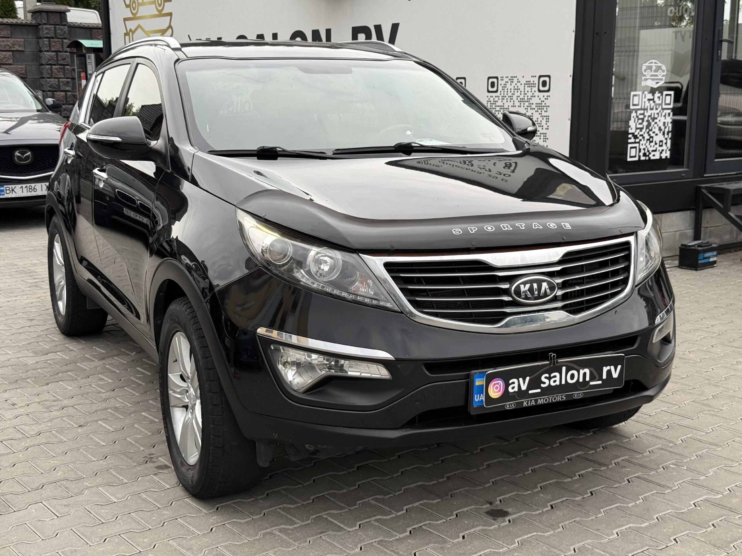 Kia Sportage — фото 1