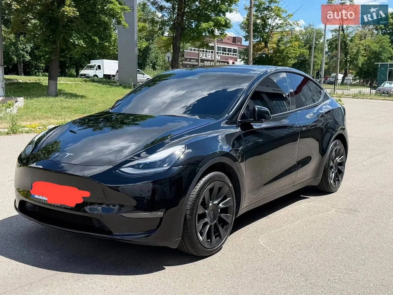 Tesla Model Y — фото 1
