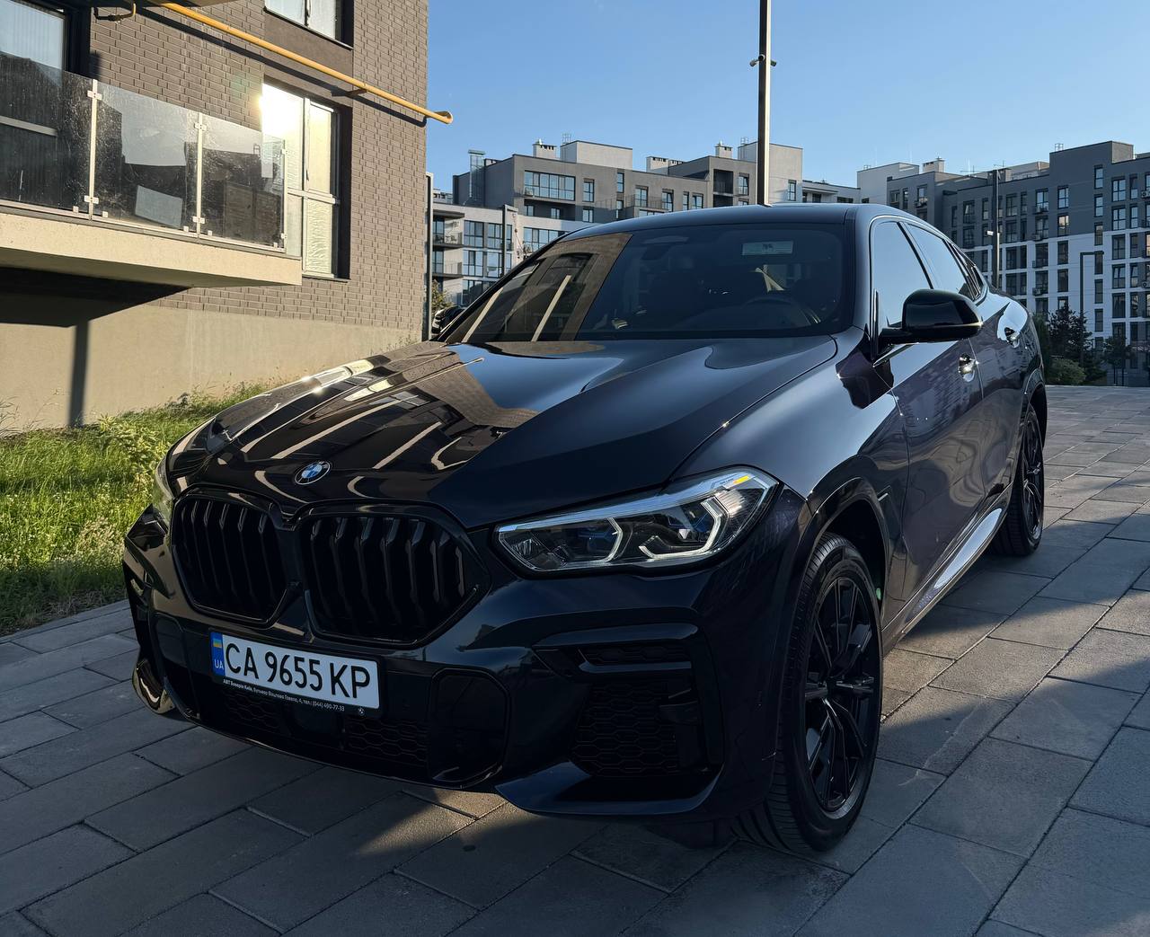 BMW X6 M50I — фото 1