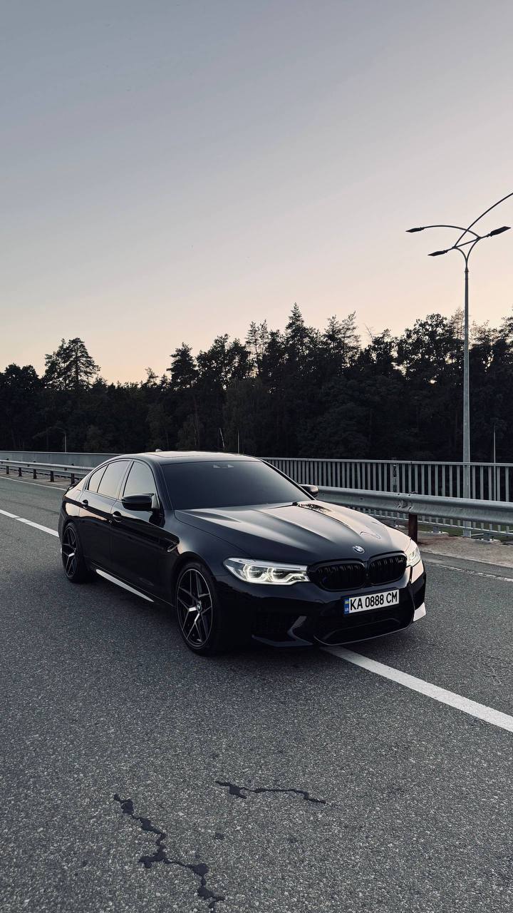 BMW M550XI — фото 1